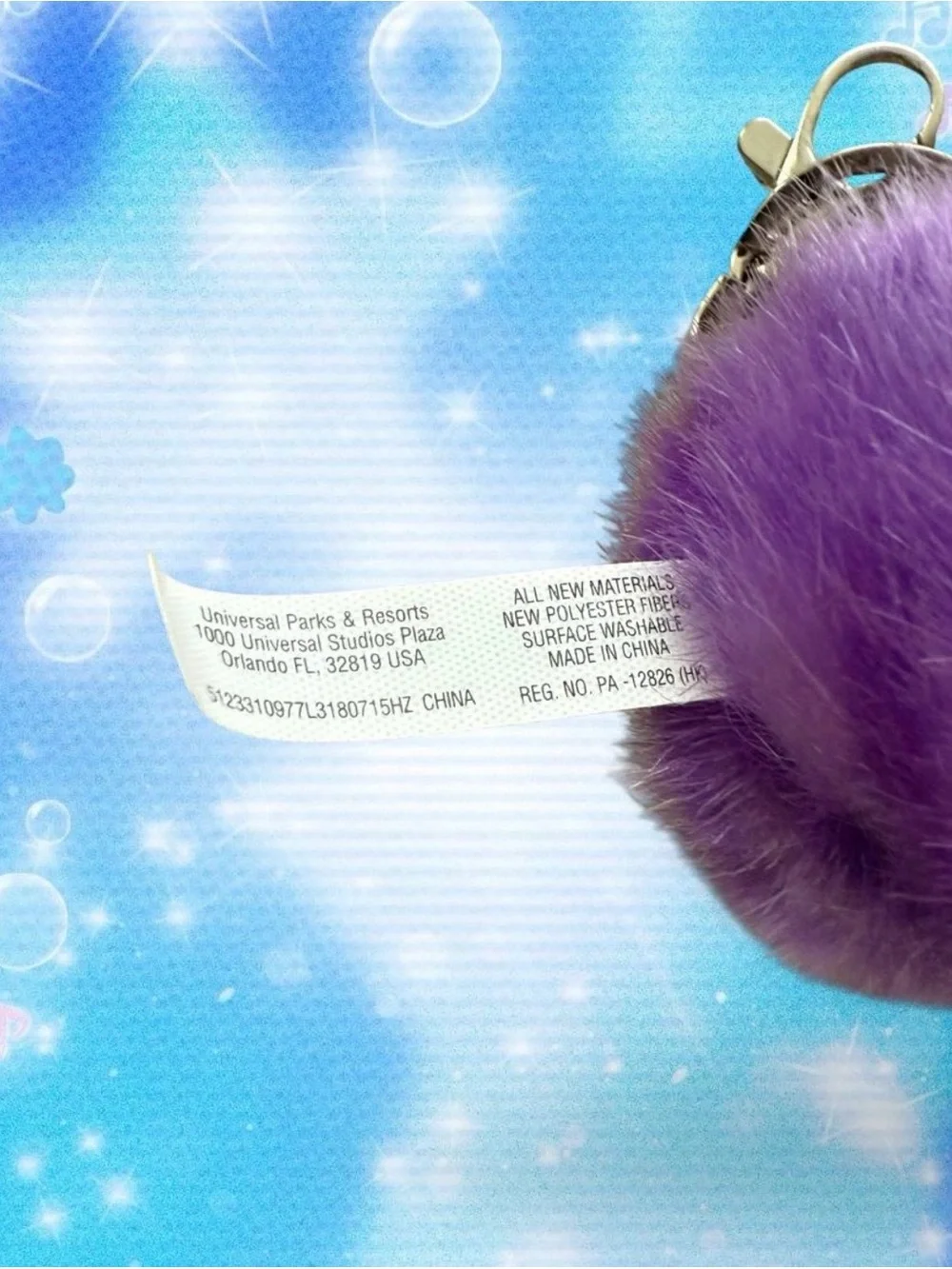 Universal Studios purple Harry Potter Wizarding World Pygmy Puff Plush keychain